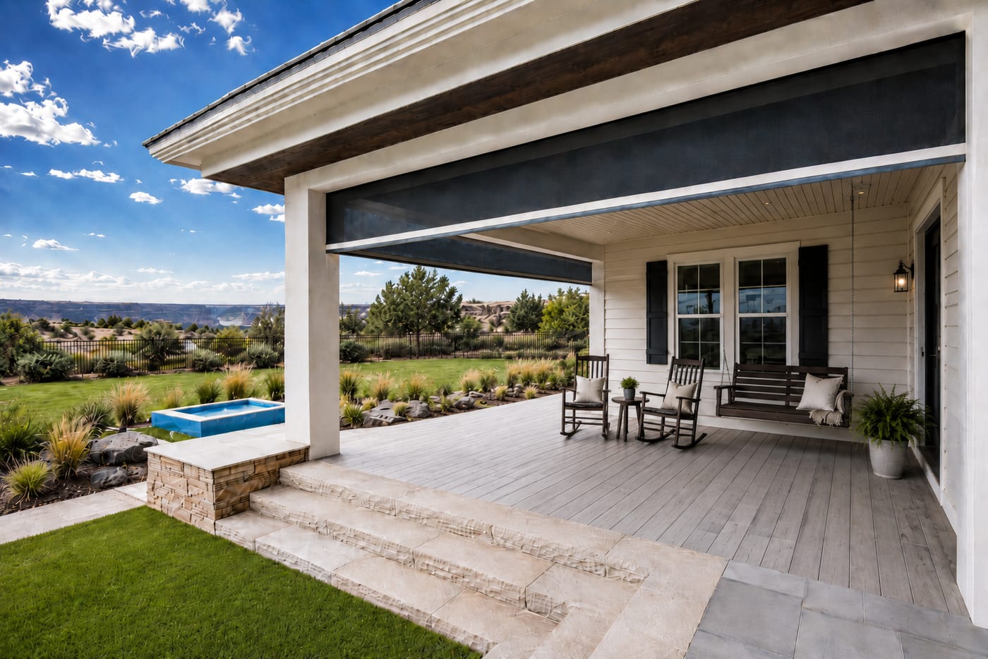 Covered porch with retractable screens on a Twin Falls area home
