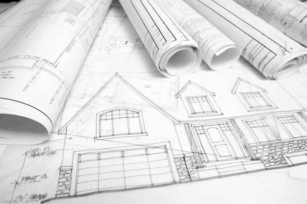Hire a residential architect to create detailed architectural blueprints for a custom outdoor living addition.