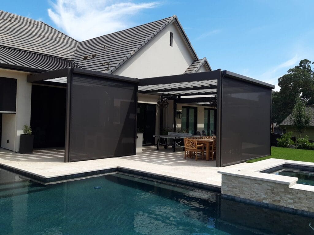 Exterior mounted shades creating a shaded outdoor space for year-round entertaining in SoCal