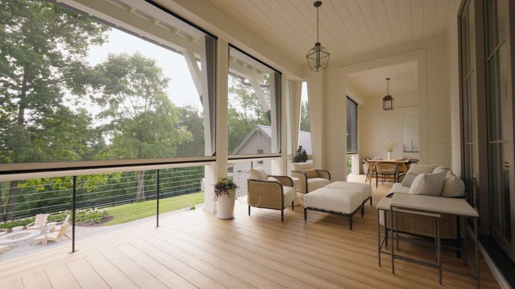 Modern patio seating area in Los Angeles with Phantom Retractable Screens fully deployed for privacy and sun control.